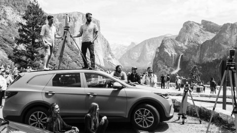 Black and white image with a car and the full ScanLabs studio  team.