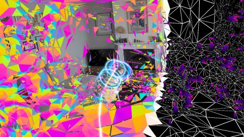 Inside a virtual world there are shapes that are pink, blue, purple, and yellow. Half of the screen is dark.