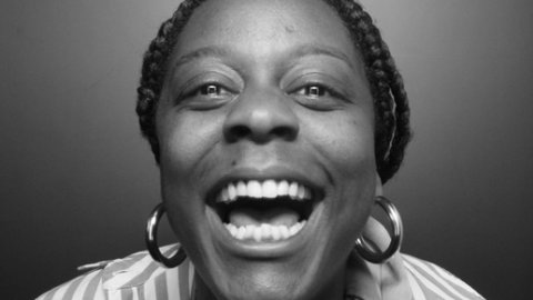 Lucy smiling in Photo Booth picture