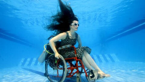 Submerged wheelchair by Sue Austin 