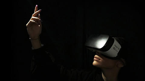 Person dancing with VR headset on