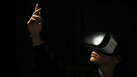 Person dancing with VR headset on