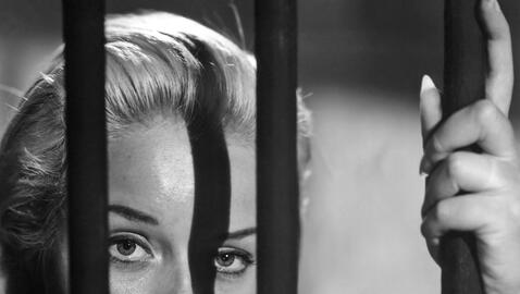 Diana Dors behind bars in Yield to the Night