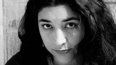 Black and white profile photo of Lorena Pino