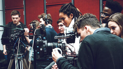 Young people as part of camera crew