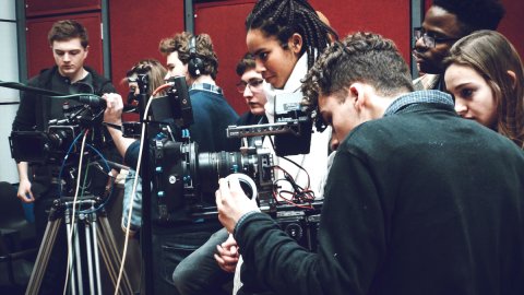 Young people as part of camera crew