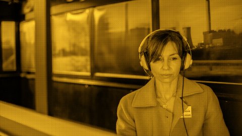 Photo of a woman wearing headphones