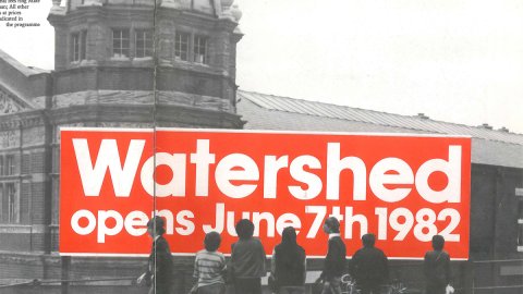 Cover of Watershed's first brochure with black & white photo of the building and text saying Watershed opens June 7th 1982