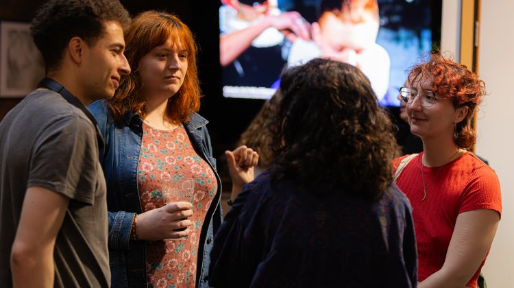 people at a First Friday meetup