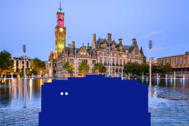 A big blue character is in the middle of Bradford city centre.