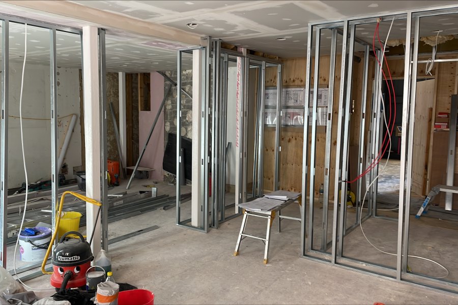 interior shot of the toilet building works which include the partitions going up for the walls