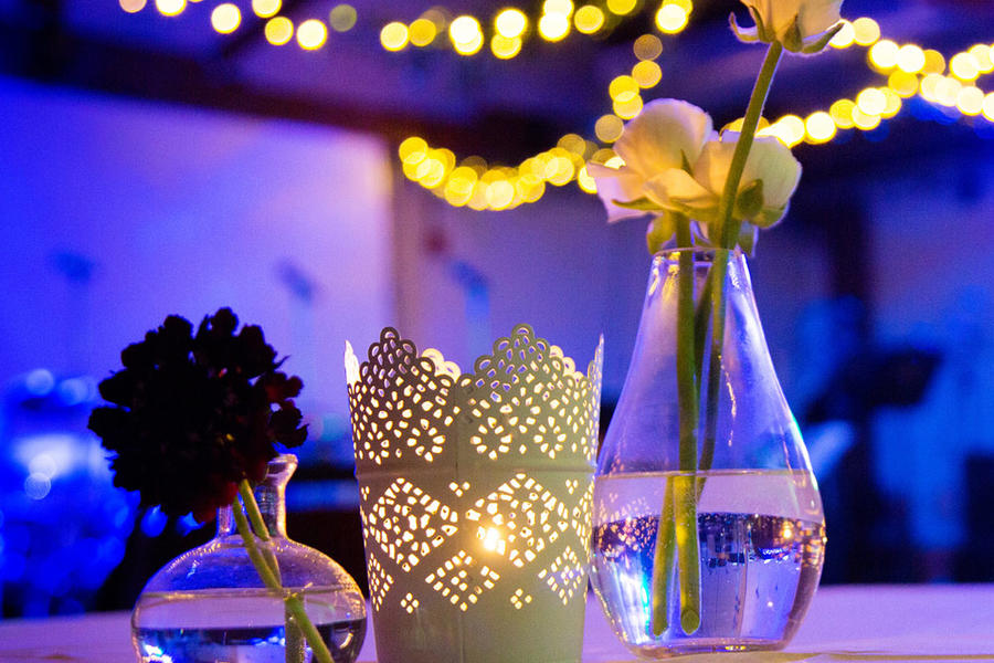Dressed candle lit table with flowers