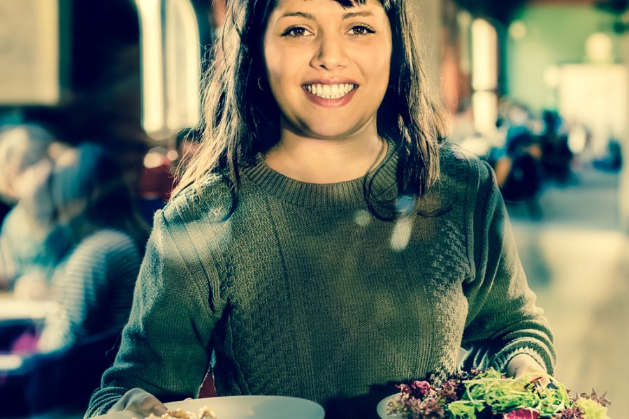 Watershed staff member serving food