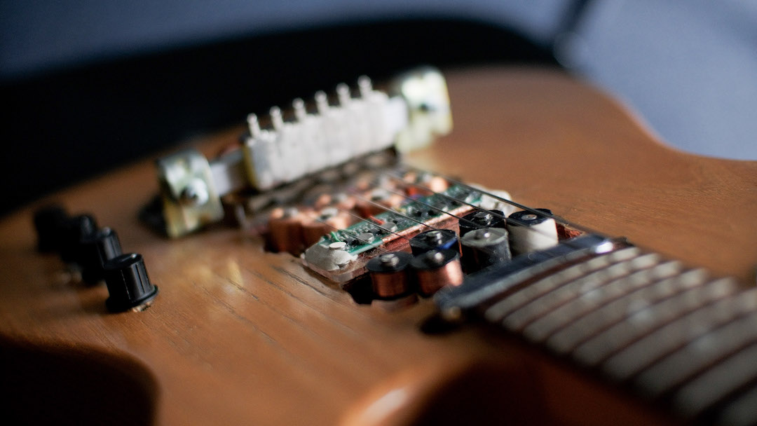 Image of solonoids in the guitar bridge
