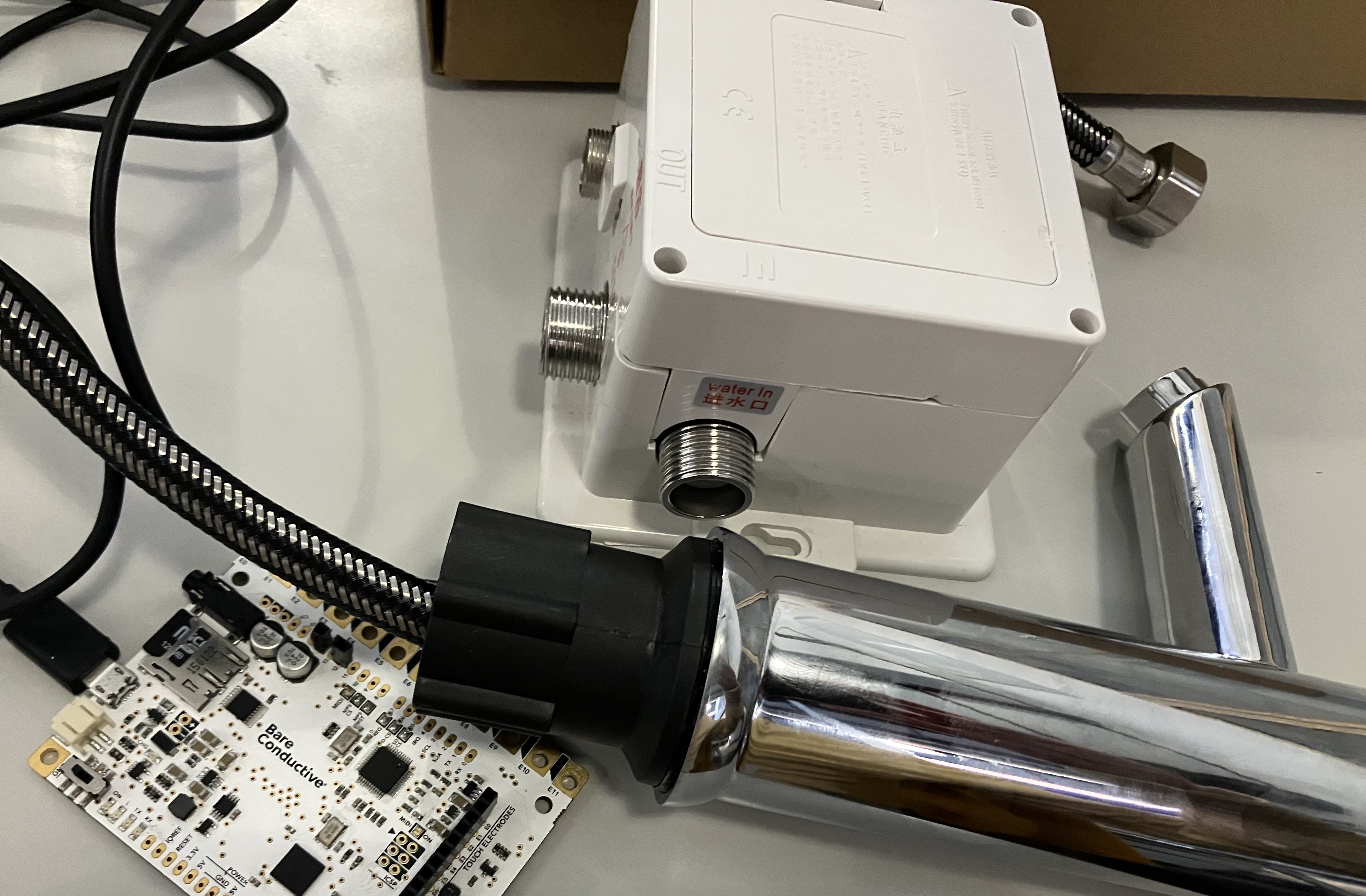 Image of tap and bare conductive board