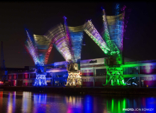 Three cranes dance on the Bristol Harbourside outside M-Shed