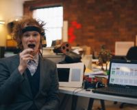 James Wheale, eating chocolate and modelling an EEG brain-scanner. Photo by resident Jack Lilley