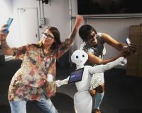Zahra, Studio Producer and myself meeting Pepper the robot.