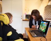 Young disabled person using Look to Learn programme by Sensory Software