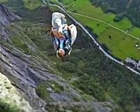 Image of a man basejumping