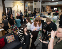 A photo of people socialising at a First Friday event in Pervasive Media Studio