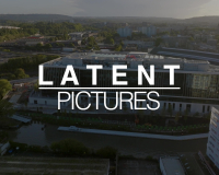 An image of a cityscape, with the LATENT PICTURES text overlaid on it. 