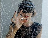 A picture of Jane Gauntlett, taken through a headset.