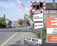 The title image for the interactive documentary, Voices of Avonmouth, depicting various signs asking questions and directing the audience. 