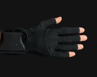 a horizontal hand wearing a MIMU black glove, with a black background.