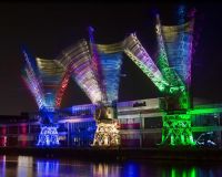 Three cranes dance on the Bristol Harbourside outside M-Shed