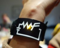 Picture of a women wearing a "WF" bracelet