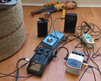 Some audio equipment on a laminate floor