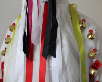 Headshot of a modern Morris dance outfit with ribbons & bells