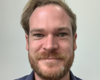 A headshot of Miles facing the camera.