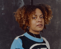 Image of Kat a Mixed Heritage Black woman in her 30s.