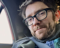 Antony Nasce, beardy man, with glasses.