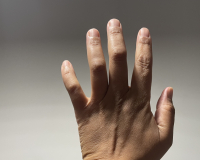 left hand held up in the air