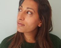 A headshot of Harmeet looking off to the left of the photo.