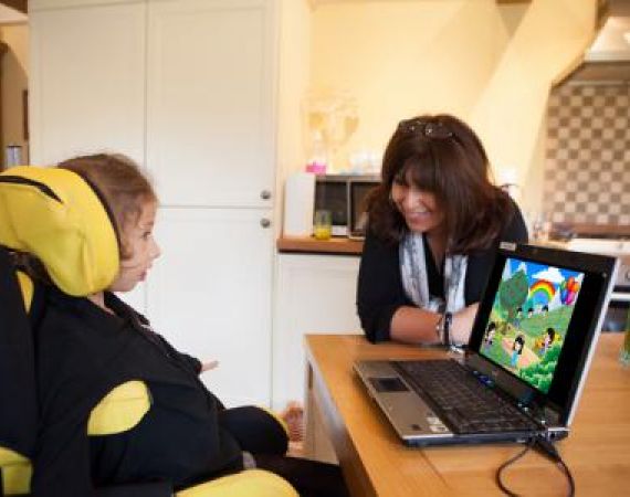 Young disabled person using Look to Learn programme by Sensory Software
