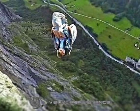 Image of a man basejumping