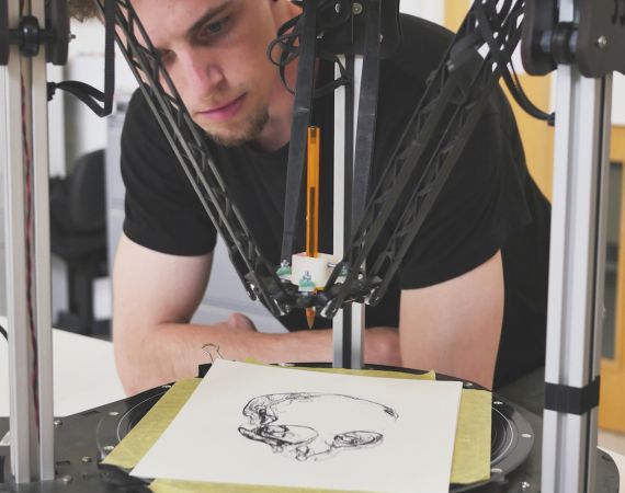 Paul O'Dowd with his drawing robot