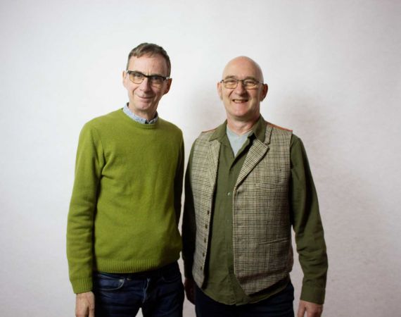 An image of Rik Lander and Phil D Hall, both looking at the camera and smiling