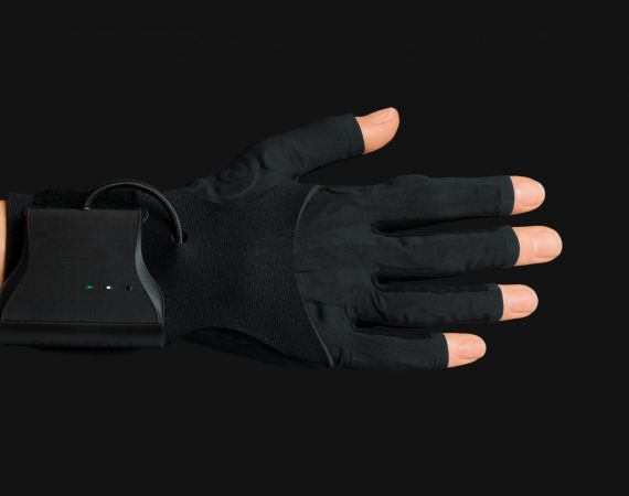 a horizontal hand wearing a MIMU black glove, with a black background.