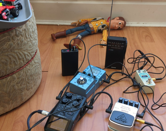 Some audio equipment on a laminate floor