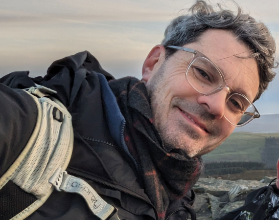 Grey haired man in the wind