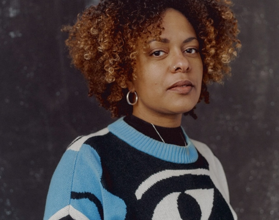 Image of Kat a Mixed Heritage Black woman in her 30s.