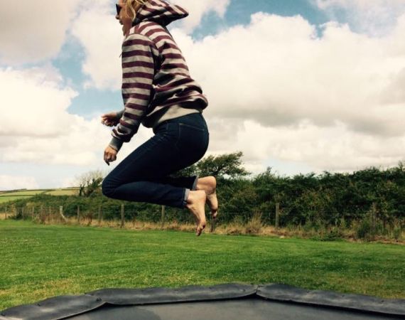 A photo of a woman jumping