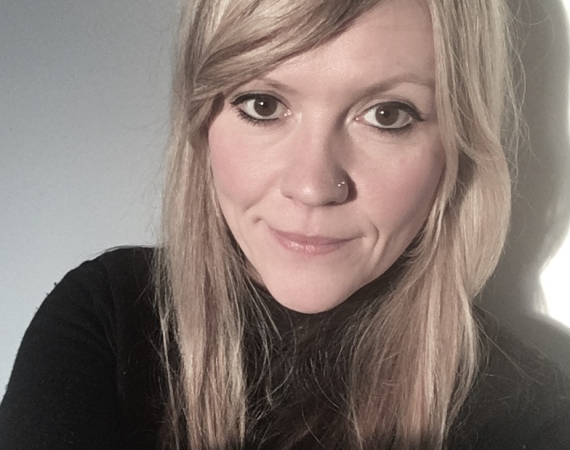 white woman, long blond hair, brown eyes