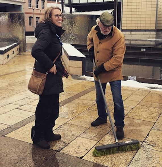 Photo: Dick Penny (CEO of Watershed at the time) shovelling snow on Millennium Square.