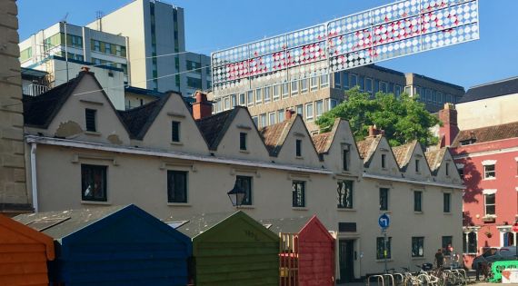 Image of coloured huts on King Street